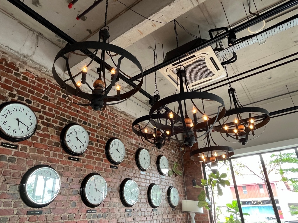 Antique chandelier in industrial design hotel